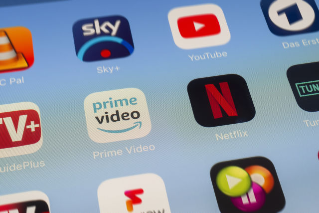 London, UK - June 01 2018: The icons of Netflix, Amazon Prime Video, TvGuidePlus, TVCatchup, VLC Player, TuneIn Radio, YouTube, Das Erste and Freeview apps on the screen of an iPad.